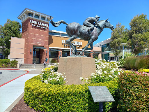 The Shops at Tanforan plaza statue and storefront